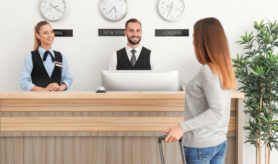 young woman near reception desk